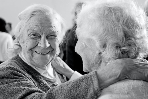 Elderly people smiling at the camera