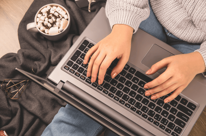 what is conversion copywriting - typing on a laptop