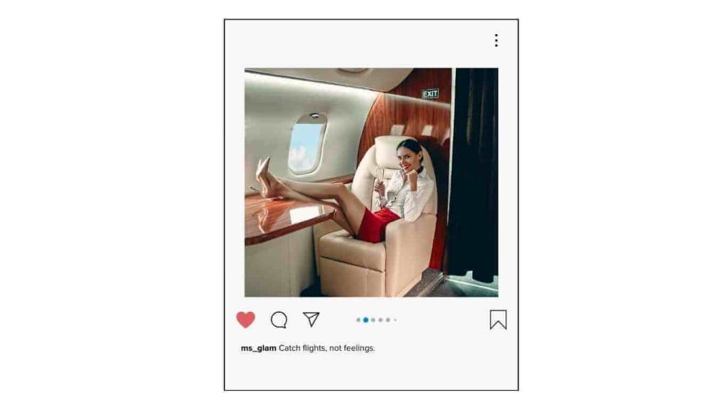 Woman relaxing on a private jet with a drink in hand, enjoying luxury.