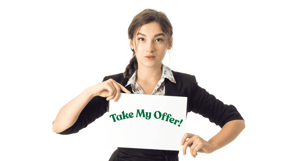 Woman holding up a sign asking audience to take her up on her offer