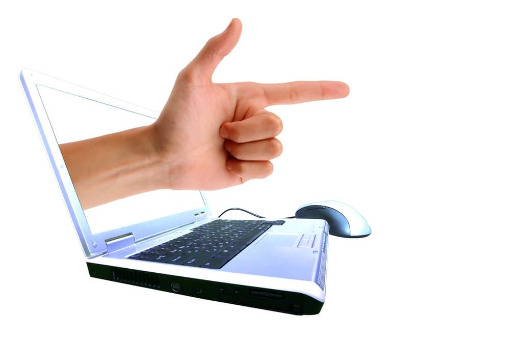 finger from laptop pointing at user