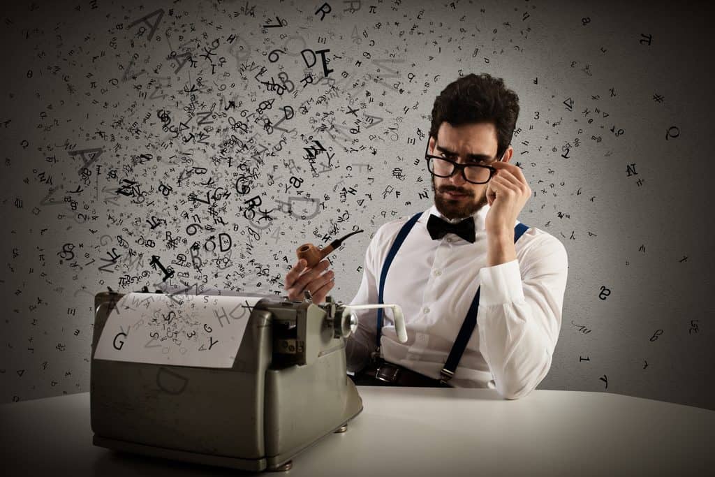 Copywriting Versus Social Media Management: Man with glasses and pipe write with a typewriter