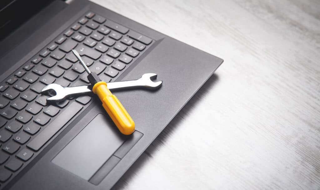 Screw Driver and Wrench pretend to be online tools on a laptop