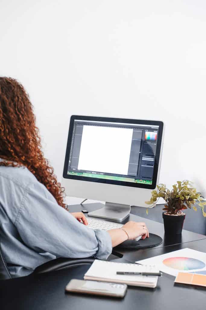 Graphic designer working on a computer